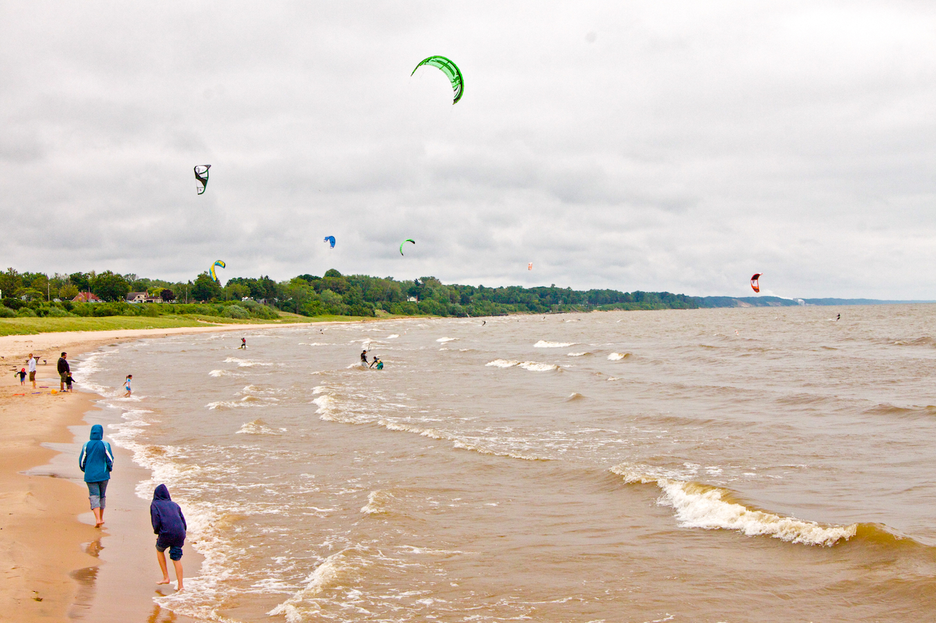 Beach photo with people and kites, used for object detection