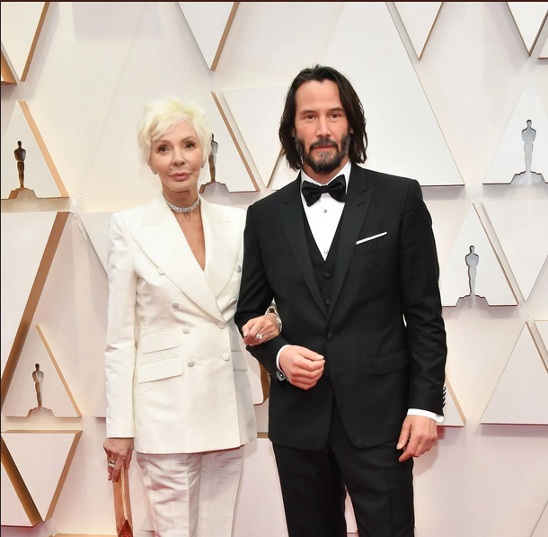 Keanu Reeves with a lady